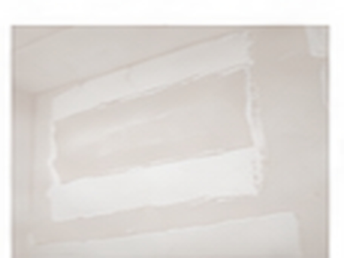 Drywall patching and paint preparation